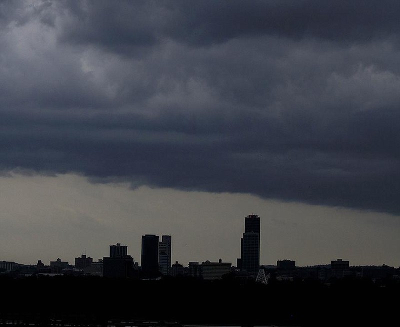 Storm clouds move in from the west Tuesday over downtown Little Rock. (Arkansas Democrat-Gazette/Staton Breidenthal) 