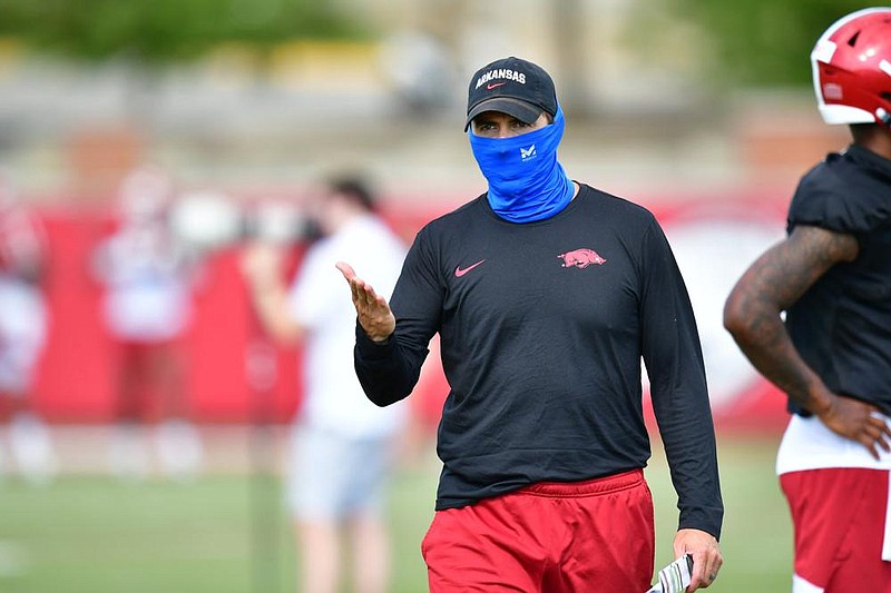 First-year offensive coordinator Kendal Briles said conditioning is a major factor in being successful in his plans for a tempo offense at Arkansas. He said the Hogs struggled with that in Friday’s scrimmage. “You saw guys dragging their tongues a little bit,” he said. “I think the want-to is there. We’ve just got to keep striving to get them there.”
(University of Arkansas/Walt Beazley)