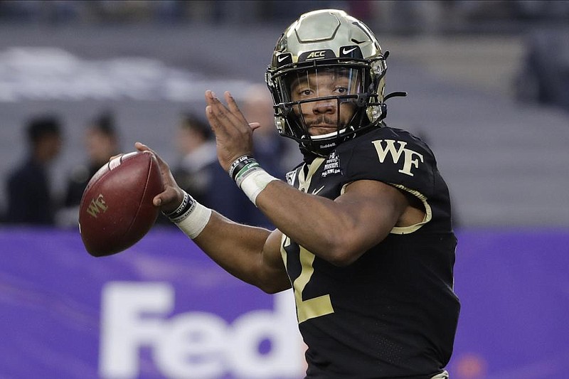 Georgia quarterback Jamie Newman, shown last season while at Wake Forest, was projected to be the starter for the Bulldogs in their opener against Arkansas on Sept. 26. But on Wednesday, he announced he was opting out of the season to prepare for the NFL Draft.
(AP file photo)