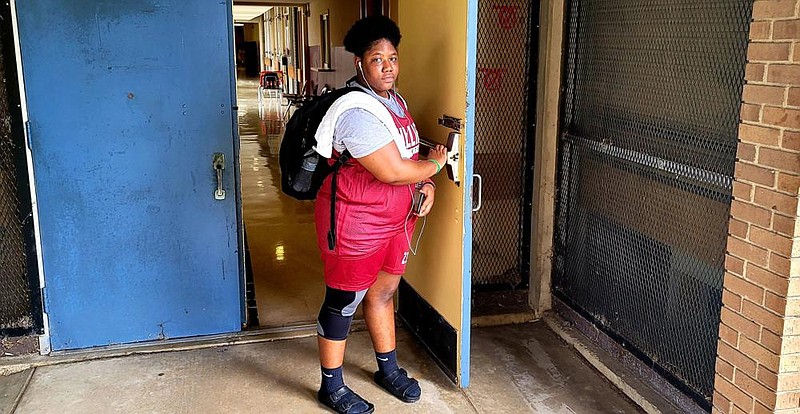 Pine Bluff High School junior Zora Little heads to basketball practice after school. She says athletics provides a sense of normalcy during the pandemic. 
(Pine Bluff Commercial/Eplunus Colvin)