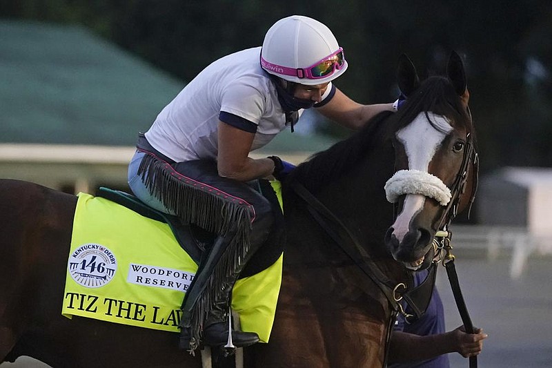 Tiz the Law, shown with exercise rider Heather Smullen this week at Churchill Downs in Louisville, Ky., is the 3-5 favorite to win today’s Kentucky Derby, making him the race’s biggest favorite in 31 years.
(AP/Darron Cummings) story.lead_photo.caption