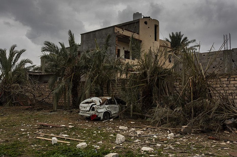 This photo shows damage from a January bomb attack in Tripoli, Libya, by Khalifa Hafter’s forces. A confidential report sent to the U.N. Security Council details extensive breaches of the international arms embargo on Libya by eight countries since the beginning of the year. (The New York Times/Ivor Prickett) 