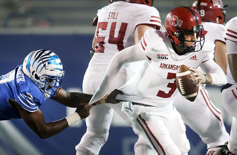 Memphis Tigers lineman Wardalis Ducksworth sacks Arkansas State quarterback Layne Hatcher during their game at Liberty Bowl Memorial Stadium on Saturday, Sept 5, 2020