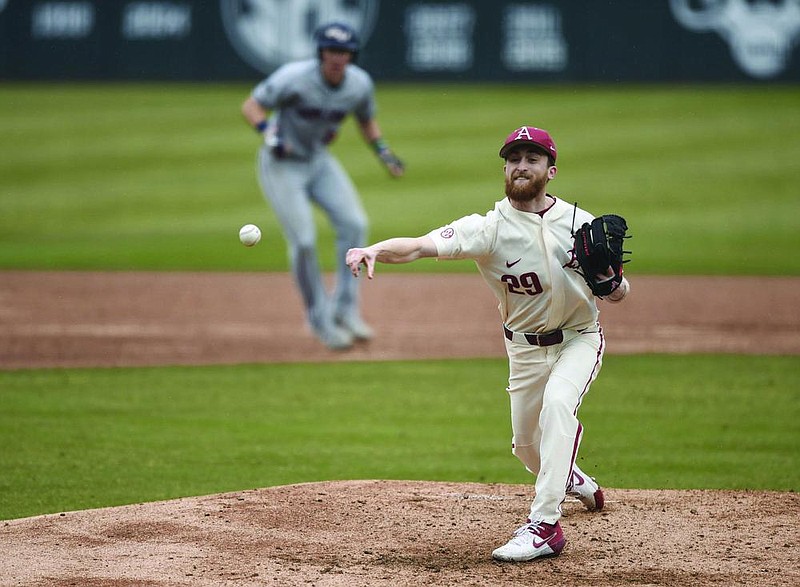 Arkansas Marshall Denton (29) throws a pitch, Sunday, February 24, 2020 during a baseball game at Baum-Walker Stadium in Fayetteville. Check out nwamedia.photoshelter.com for todayâ€™s photo gallery.
(NWA Democrat-Gazette/Charlie Kaijo)

