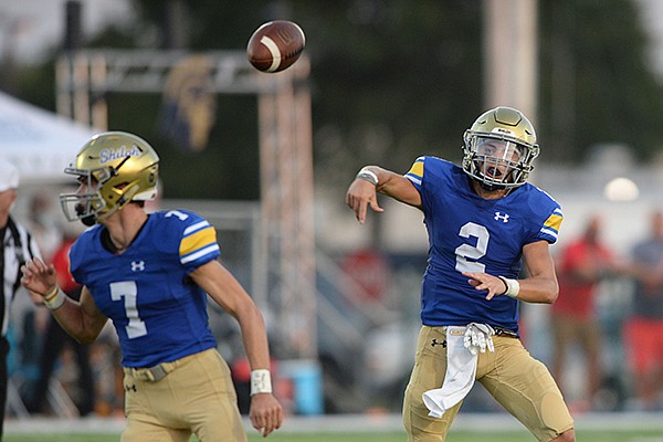 Shiloh Christian quarterback Eli Wisdom (2) passes Friday, Aug. 28, 2020, against Pea Ridge during the first half of play at Champions Stadium in Springdale.