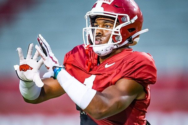 Jalen Catalon catches a ball inside Razorback Stadium on Thursday, September 10, 2020. The Razorbacks practiced under the lights to simulate a 6 p.m kickoff. Photo courtesy Arkansas Communications.