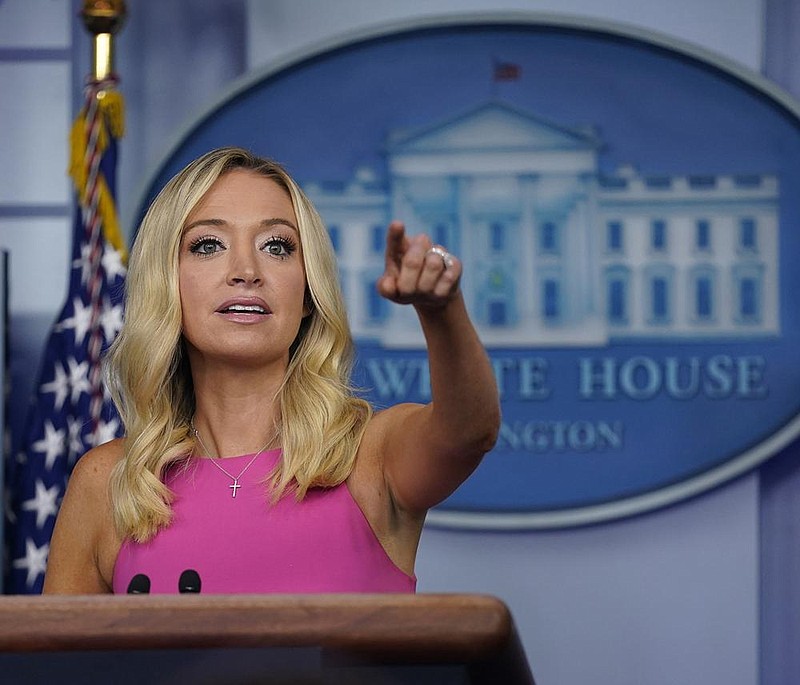 “The president has never lied to the American public on [covid-19],” White House press secretary Kayleigh McEnany said Wednesday at a news conference. “The president was expressing calm, and his actions reflect that.” More photos at arkansasonline.com/910briefing/.
(AP/Evan Vucci)