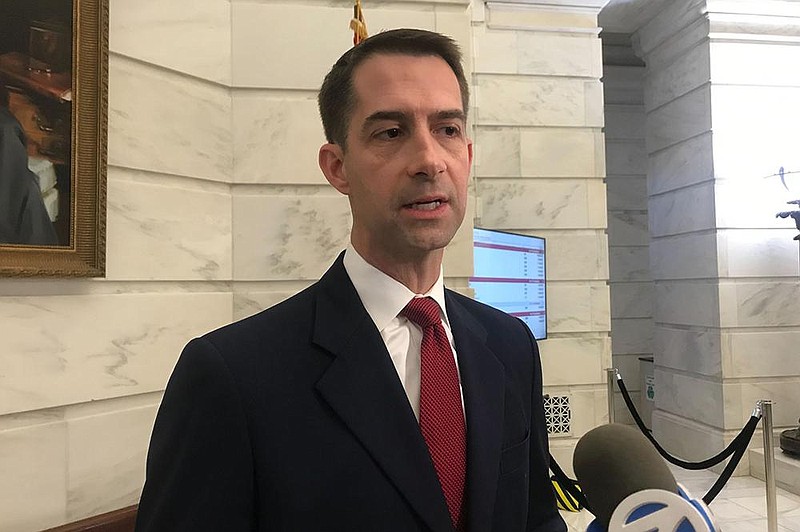 Republican U.S. Sen. Tom Cotton talks to reporters after filing for re-election at the Arkansas state Capitol in Little Rock on Nov. 4, 2019. (AP Photo/Andrew Demillo)