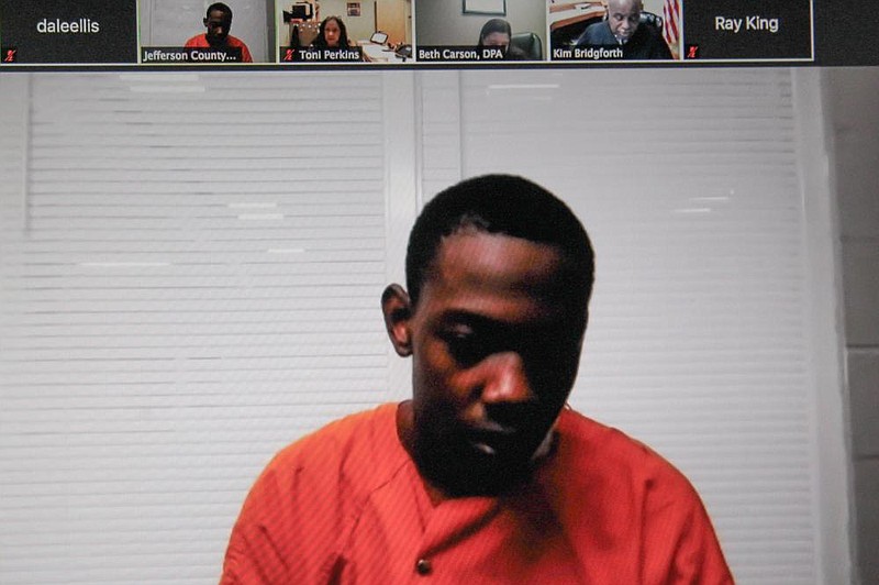 Vernon Lee McCraney III, shown on a video monitor during a remote probable-cause hearing before District Judge John Kearney, was ordered to be held on a charge of first-degree murder in connection with the Sept. 3 shooting death of Horace Harrington. Kearney set McCraney’s bail at $500,000 and ordered him to appear in District Court at 9 a.m. Oct. 21 for a first appearance on the charge. 
(Pine Bluff Commercial/Dale Ellis)