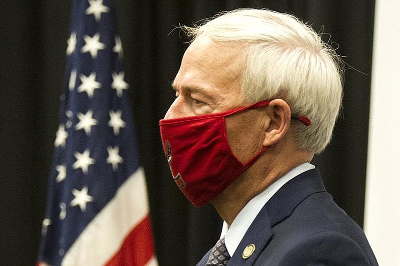 Gov. Asa Hutchinson waits to speak at his last daily coronavirus update Friday, Sept. 11, 2020, in Mena. He cautioned against overreacting to that day's sudden jump in cases, setting what was then a record of 1,180 new coronavirus cases in Arkansas. More photos at arkansasonline.com/912gov/.