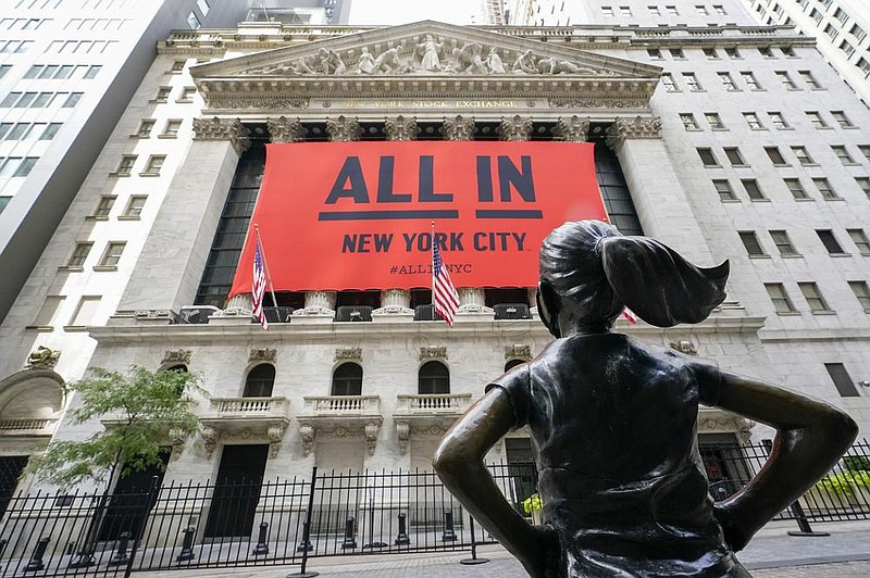 The “Fearless Girl” bronze sculpture in front of the New York Stock Exchange is pictured Thursday as stocks were nearing the end of a tumultuous week.
(AP/Mary Altaffer)