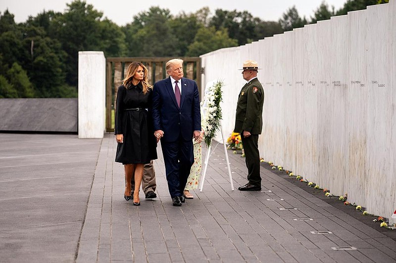 President Donald Trump and first lady Melania Trump finish laying a wreath at the Flight 93 National Memorial in Shanksville, Pa.
(The New York Times/Erin Schaff)