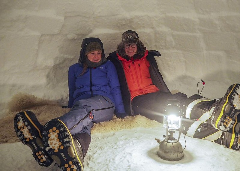 Field guide Sasha Doyle and meteorological observer Jack Farr relax in an igloo in Antarctica’s Trident area, Adelaide island, in October last year. A council of 30 countries moved early to keep the coronavirus out. More photos at arkansasonline.com/913covid/.
(AP/British Antarctic Survey/Robert Taylor)