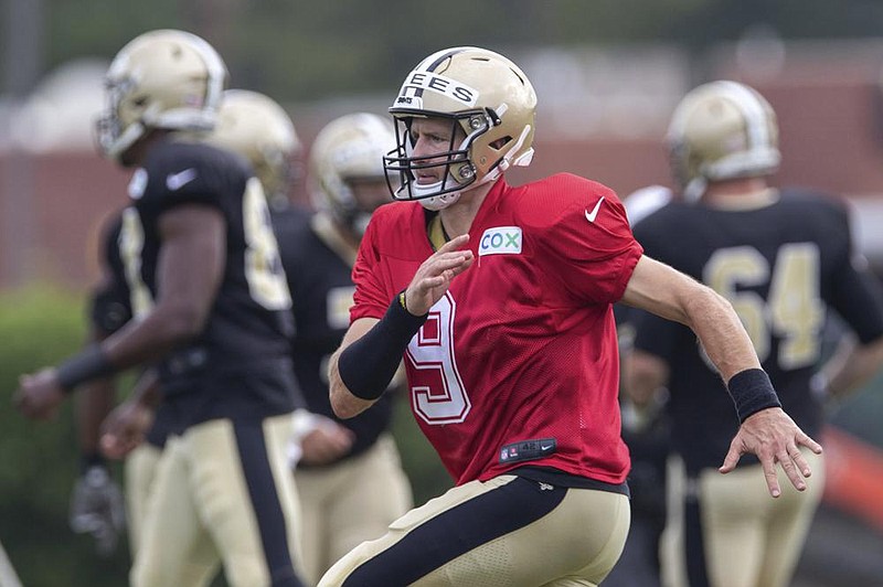 Quarterback Drew Brees and the New Orleans Saints will host the Tampa Bay Buccaneers in the season opener today. Coverage begins at at 3:25 p.m. on Fox.
(AP/The Advocate/David Grunfeld)
