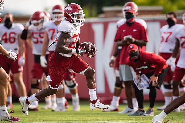 Arkansas running back Trelon Smith runs with the ball during a practice at the Razorbacks' practice facility on September 14, 2020. Photo courtesy Arkansas communications.