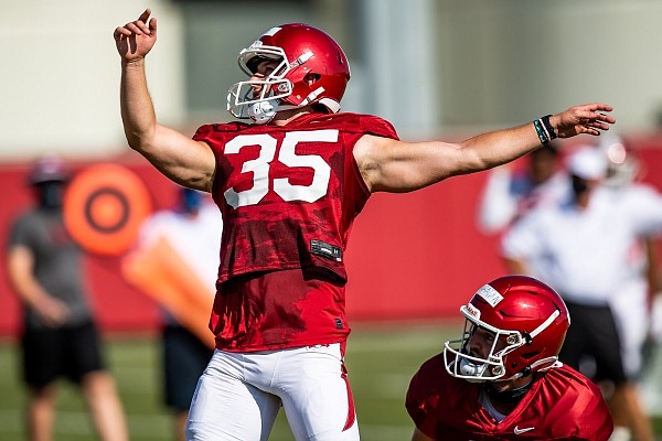 Arkansas kicker A.J. Reed attempts a field goal during a preseason practice on Aug. 28, 2020 in Fayetteville.