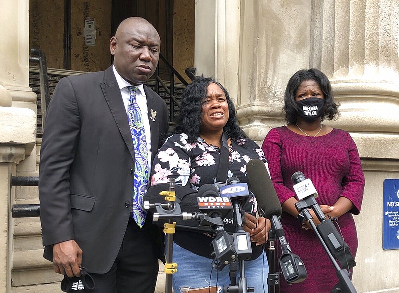 Tamika Palmer, mother of Breonna Taylor, addresses the media in Louisville, Ky. on Thursday, Aug. 13, 2020. Five months after her daughter was shot to death by police, Palmer said she is trying to be patient while waiting to hear if the officers will be charged. (AP Photo/Dylan Lovan) story.lead_photo.caption