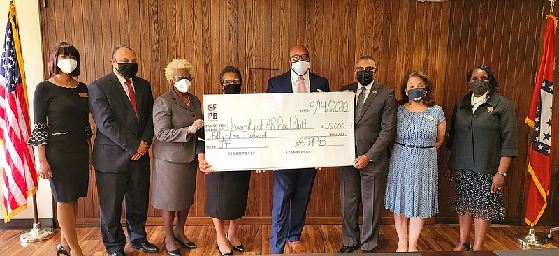Go Forward Pine Bluff CEO Ryan Watley presented a check Monday afternoon in the amount of $55,000 Monday afternoon to UAPB School of Education, Interim Dean Dr. Newell to fund a nine-month Visiting Professor Chair for the Innovation of the UAPB ‘s Education Preparatory Program. (Pictured l to r) Dr. Celeste Alexander, Dr. Robert Z. Carr, Jr., Dr. Vera Lang-Brown, Dr. Wanda Newell, Dr. Ryan Watley, Dr. Laurence B. Alexander, Mrs. Mildred Franco and Dr. Mary Liddell.