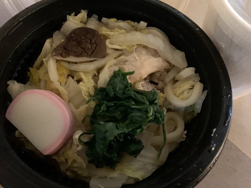 Nabeyaki Udon, noodles with vegetables and chicken, from Mt. Fuji awaits the addtion of the rich broth, packaged separately (right).
(Arkansas Democrat-Gazette/Eric E. Harrison)