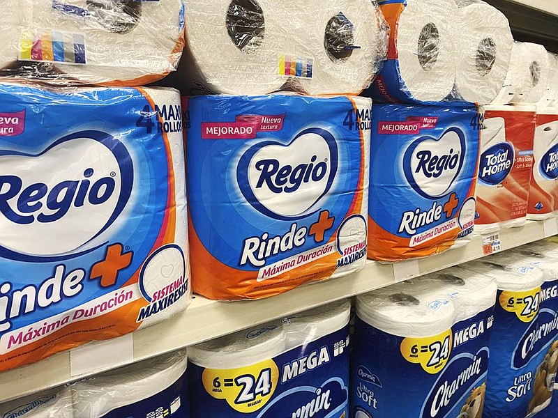 Regio, a Mexican toilet paper brand, fills a shelf earlier this month at a CVS store in New York. (AP/ Joseph Pisani) 