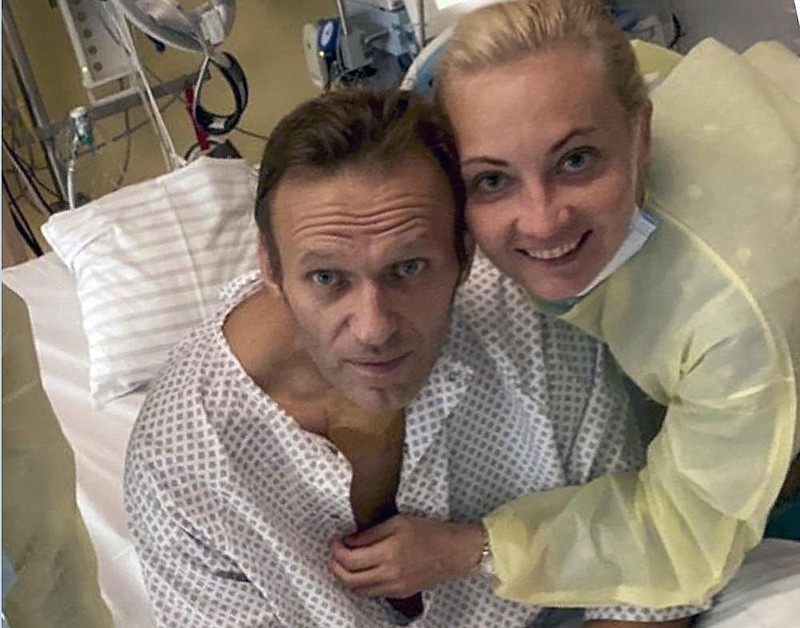 Russian opposition leader Alexei Navalny is shown with his wife, Yulia, at a hospital in Berlin in this photo posted Tuesday by Navalny. (AP/Instagram) story.lead_photo.caption
