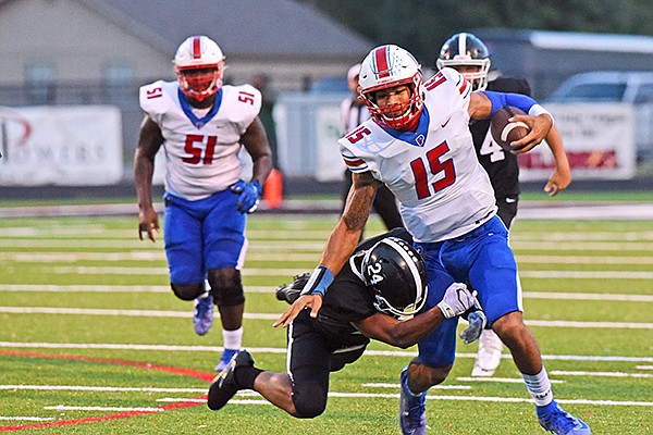 Little Rock Parkview quarterback Landon Rogers (15) carries the ball during a game against White Hall on Thursday, Sept. 11, 2020, in White Hall. 