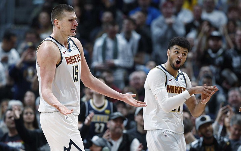 Nikola Jokic (left) and Jamal Murray have led the Denver Nuggets into the NBA Western Conference finals for the first time since 2009. The Nuggets will be underdogs in the series against the Los Angeles Lakers, a role the team has relished this postseason.
(AP file photo)