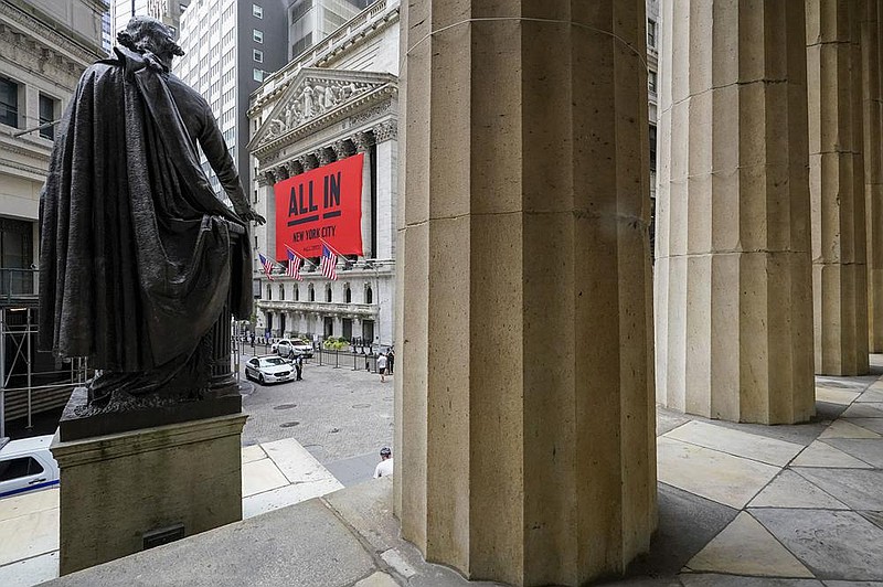 A statue of George Washington stands near the New York Stock Exchange. The S&P 500 this month hit its most expensive level since late 2000, when measured in relation to corporate profi ts.
(AP/Mary Altaffer)