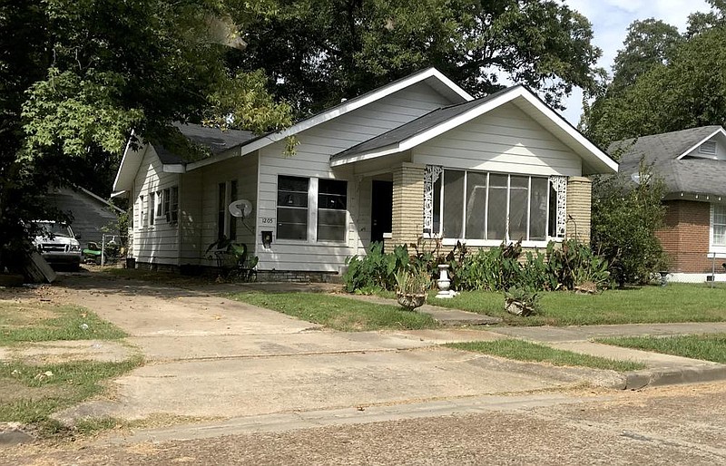 An 8-year-old boy was shot early Thursday in a drive-by shooting at this Pine Bluff house. 
(Pine Bluff Commercial/Dale Ellis)