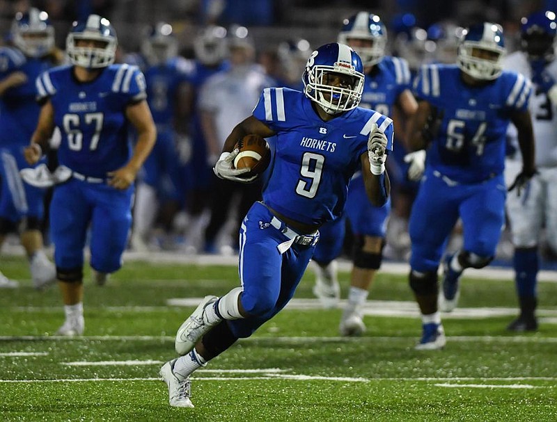 Bryant running back Tanner Anderson (9) runs for a touchdown against Trinity Christian during Friday night's game at Hornet stadium in Bryant. (Special to the Democrat-Gazette/Jimmy Jones)