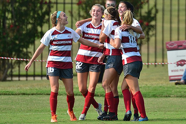 Arkansas' Parker Goins (22) celebrates with teammates after scoring a goal during the second half of a game against LSU on Saturday, Sept. 19, 2020, in Fayetteville. Arkansas' Parker Goins (22) celebrates with teammates after scoring a goal during the second half of a game against LSU on Saturday, Sept. 19, 2020, in Fayetteville.