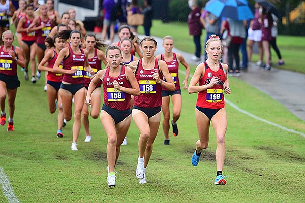 Arkansas runners Abby Gray (158) and Taylor Ewert (159) lead the pack during the SEC Preview meet on Saturday, Sept. 19, 2020, in Baton Rouge, La. 