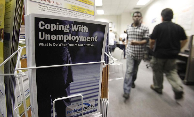 People arrive to seek employment opportunities at a JobTrain office in Menlo Park, Calif., in July. The Department of Labor reports that more than 6 million Californians are claiming Pandemic Unemployment Assistance benefits each week.
(AP)