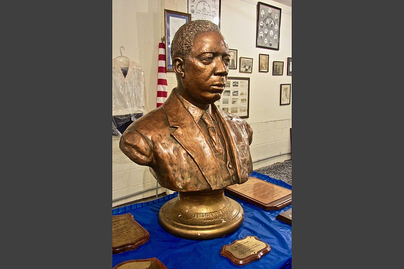 A sculpture of Floyd Brown is displayed at Fargo Agricultural School Museum.