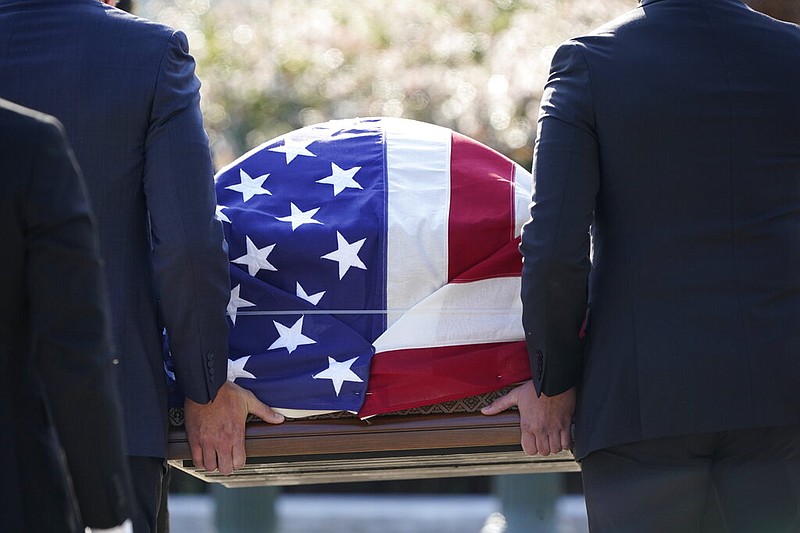 The flag-draped casket of Justice Ruth Bader Ginsburg arrives at the Supreme Court in Washington, Wednesday, Sept. 23, 2020. Ginsburg, 87, died of cancer on Sept. 18.