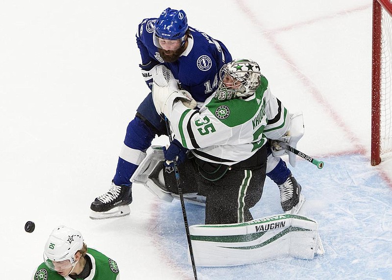 Pat Maroon of the Tampa Bay Lightning crashes into Dallas Stars goaltender Anton Khudobin during the Lightning’s 3-2 victory Monday night in the Stanley Cup Final. (AP/The Canadian Press/Jason Franson) 