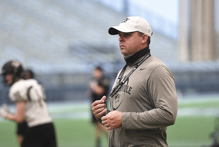 FILE -- Coach Jody Grant watches his players, Friday, August 7, 2020 during a football practice at Tiger Stadium in Bentonville. (NWA Democrat-Gazette/Charlie Kaijo)