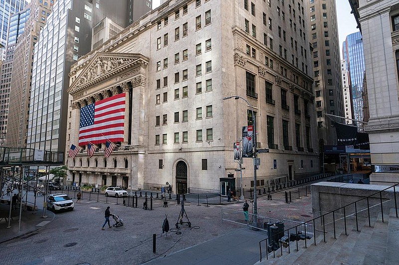A large American Flag hangs Monday on the New York Stock Exchange. Stocks fell to an eight-week low Wednesday.
(AP/Mary Altaffer)