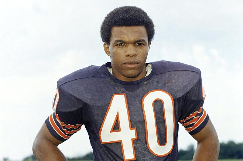 Gale Sayers, who died Wednesday at 77, was a unanimous choice for NFL rookie of the year in 1965. He set one NFL record with six touchdowns in a game and set another with 22 touchdowns in his first season: 14 rushing, 6 receiving, 1 punt and 1 kickoff return.
(AP file photo)
