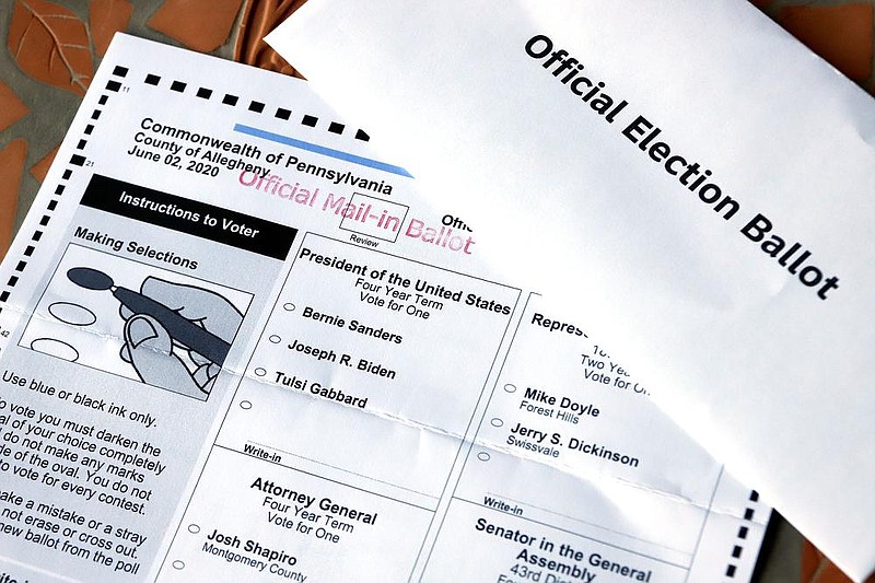 An official Democratic general primary mail-in ballot and secrecy envelope is shown May 26 for the Pennsylvania primary. Similar ballots for the Nov. 3 election will be disqualified if the secrecy envelope is not used to mail them.
(AP/Gene J. Puskar)