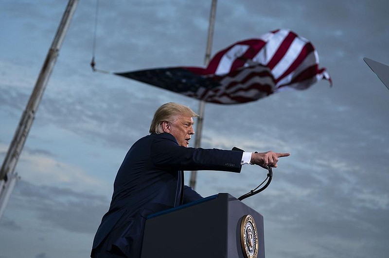 President Donald Trump speaks at a campaign rally Thursday at Cecil Airport in Jacksonville, Fla., as he continues to fan uncertainty over the legitimacy of the election.
(AP/Evan Vucci)