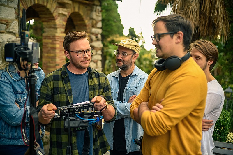 Molto Bella was filmed in Taormina, Sicily in late 2019. Pictured left to right are Andrea von Kampen (behind monitor), Paul Petersen, Joel Froome, Alexander Jeffery and Kenny Burns. (Contributed)