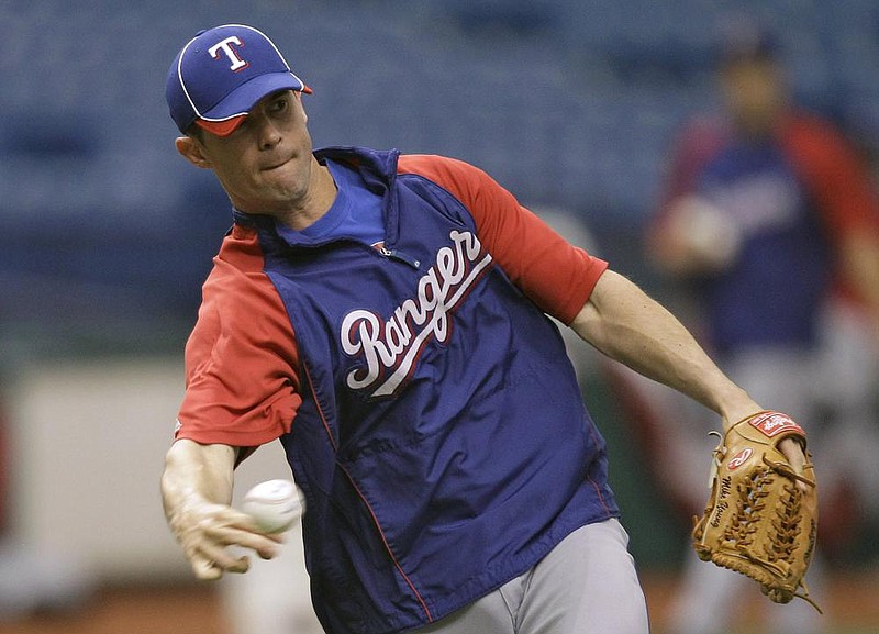 Texas Rangers third baseman Michael Young reached 200 hits for the fifth consecutive season on this date in 2007 in a 16-2 victory over the Los Angeles Angels.
(AP file photo)