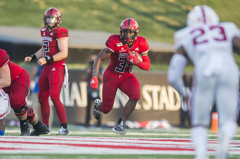 Arkansas State junior running back Marcel Murray (34), who is the Red Wolves’ most experienced back, is set to return to the lineup after missing ASU’s first two games with a groin injury.
(Democrat-Gazette file photo)