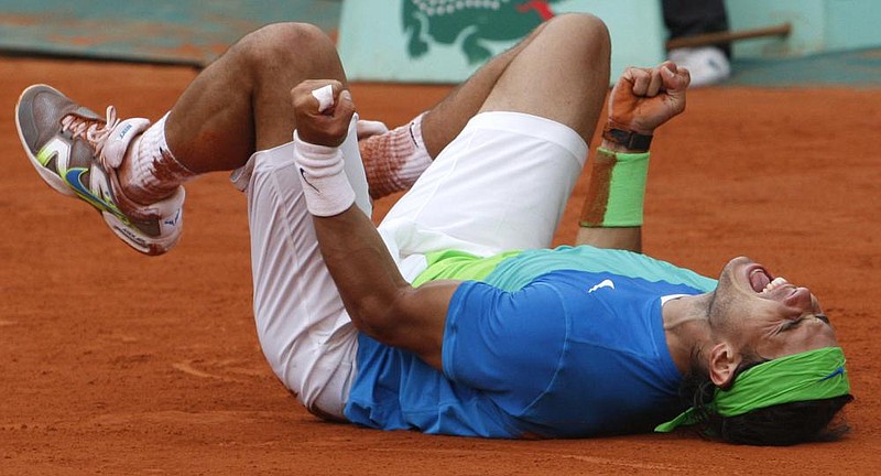 Rafael Nadal celebrates after defeating Sweden’s Robin Soderling during the 2010 French Open. Nadal is attempting to win the French Open for a 13th time, which would also be his 20th major title.
(AP file photo)