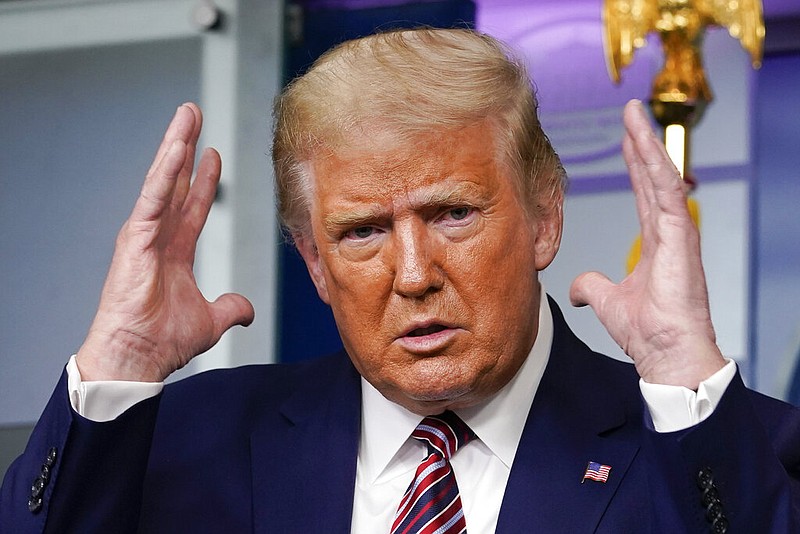 President Donald Trump gestures while speaking during a news conference at the White House in Washington on Sunday, Sept. 27, 2020.