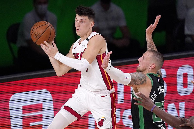 Tyler Herro of the Miami Heat has shot 37.9% on three-pointers during the NBA playoffs. Three-point shooting is a big part of the Heat’s success. but in Friday’s 121-108 loss to the Boston Celtics in Game 5 of the Eastern Conference finals, the Heat made only 7 of 36 three-pointers. 
(AP/Mark J. Terrill) 