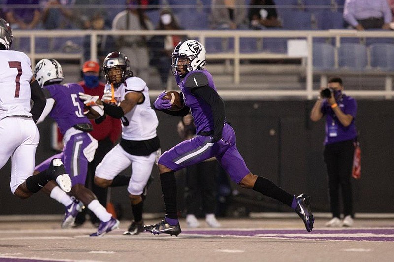 UCA wide receiver Tyler Hudson, center, runs the ball down field during their Sept. 27 game against Missouri State at Estes Stadium in Conway.
(Arkansas Democrat-Gazette/Justin Cunningham)