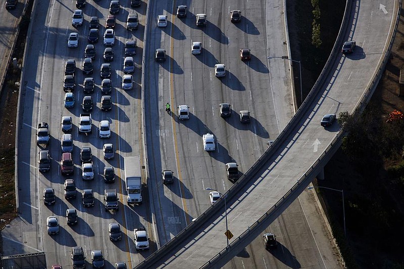 Vehicles sit in rush-hour traffic at the interchange of Interstates 405 and 10 in Los Angeles.
(Bloomberg News/Patrick T. Fallon)