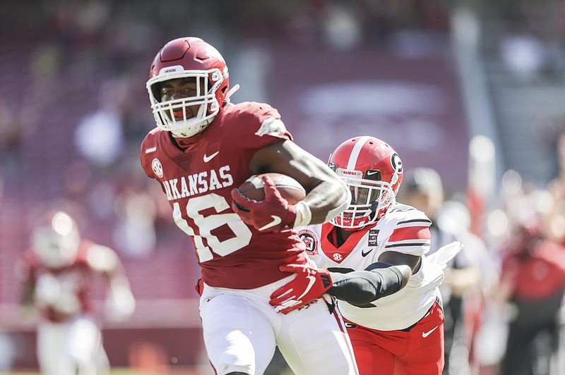 Burks gets first TD as a Hog